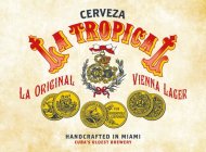 CERVEZA LA TROPICAL LA ORIGINAL VIENNA LAGER ARTS-SCIENCIE BRUXELLES AUSSTELLUNGEBRAUREREI & WRISOHAFTSWSIN MUNCHEN DE 1906 FUR VERDIENSTVOLLI LEISTRUNGEN HANDCRAFTED IN MIAMI CUBA'S OLDEST BREWERY