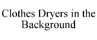CLOTHES DRYERS IN THE BACKGROUND