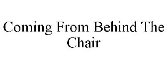 COMING FROM BEHIND THE CHAIR