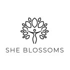 SHE BLOSSOMS