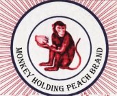 MONKEY HOLDING PEACH BRAND