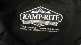 THE WORD KAMP-RITE AND EST.1998 BELOW KAMP-RITE AND A BANNER OVERLAPPING THE HEXAGON WITH THE WORDS 